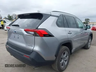 2023 Toyota RAV4 Hybrid LE with VIN 4T3MWRFVXPU086012, listed as a IAAI auction lot 42077859 with 1,140 mi miles. Bid and sale history available at carsss.com. Image 4.