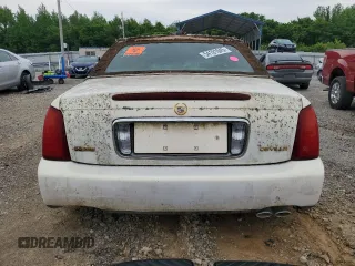 2004 Cadillac DeVille z VIN 1G6KD54Y24U186197, wystawiony jako Copart lot #54191045 z przebiegiem Nie podano mil oraz Szkody całkowita. Historia ofert i sprzedaży dostępna na DreamBid. Obrazek 6.