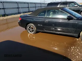 2001 Toyota Solara SE z VIN 2T1FF28P61C526694, wystawiony jako Copart lot #76948134 z przebiegiem Nie podano mil oraz Szkoda całkowita • Salvage title. Historia ofert i sprzedaży dostępna na DreamBid. Obrazek 11.