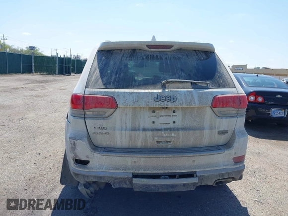 2014 Jeep Grand Cherokee Summit z VIN 1C4RJFJG3EC213145, wystawiony jako IAAI lot #41918145 z przebiegiem 176 460 mil mil oraz . Historia ofert i sprzedaży dostępna na DreamBid. Obrazek 16.