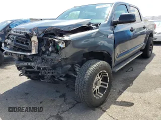 2010 Toyota Tundra with VIN 5TFEY5F15AX087902, listed as a Copart auction lot 55799495 with 128,191 mi miles and Salvage title. Bid and sale history available at DreamBid. Image 1.