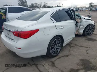2014 Infiniti Q50 Premium with VIN JN1BV7AP0EM688888, listed as a IAAI auction lot 41537933 with 114,260 mi miles and . Bid and sale history available at carsss.com. Image 4.