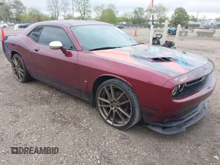 2019 Dodge Challenger SXT z VIN 2C3CDZAG7KH620445, wystawiony jako IAAI lot #42146223 z przebiegiem 102 978 mil mil oraz . Historia ofert i sprzedaży dostępna na DreamBid. Obrazek 1.