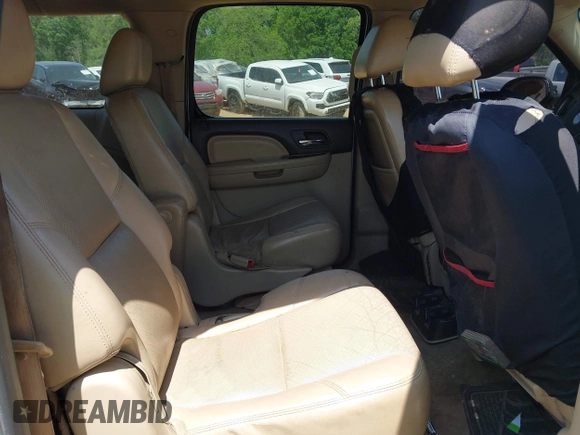 2011 GMC Yukon XL Denali with VIN 1GKS2MEF9BR198152, listed as a IAAI auction lot 41990816 with 235,010 mi miles. Bid and sale history available at carsss.com. Image 8.