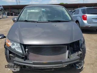 2014 Honda Odyssey EX-L z VIN 5FNRL5H64EB089875, wystawiony jako IAAI lot #42279431 z przebiegiem 107 716 mil mil oraz . Historia ofert i sprzedaży dostępna na DreamBid. Obrazek 13.