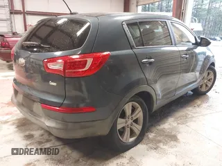 2013 Kia Sportage LX with VIN KNDPB3A2XD7446504, listed as a IAAI auction lot 41271313 with 94,646 mi miles and . Bid and sale history available at DreamBid. Image 4.