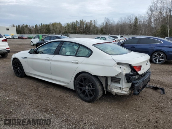2015 BMW 6 Series 640i xDrive z VIN WBA6B8C56FD453175, wystawiony jako Copart lot #81372044 z przebiegiem 111 835 mil mil oraz Czysty tytuł • Clean title. Historia ofert i sprzedaży dostępna na DreamBid. Obrazek 2.