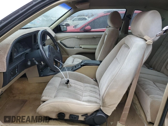 1987 Ford Thunderbird with VIN 1FABP64W7HH137025, listed as a Copart auction lot 80162264 with 137,140 mi miles and Salvage Title. Bid and sale history available at DreamBid. Image 7.