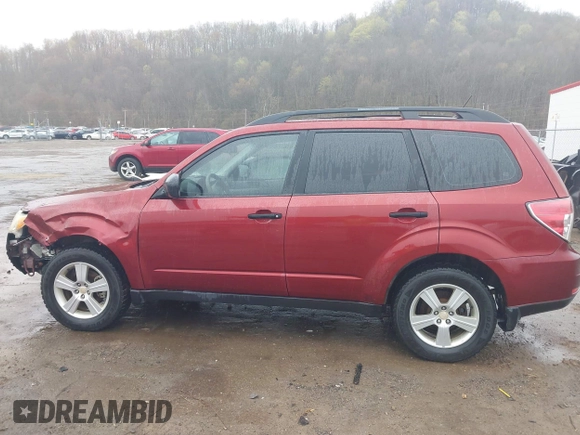 2011 Subaru Forester X with VIN JF2SHBBC0BH722336, listed as a IAAI auction lot 41973327 with 173,935 mi miles and . Bid and sale history available at DreamBid. Image 14.