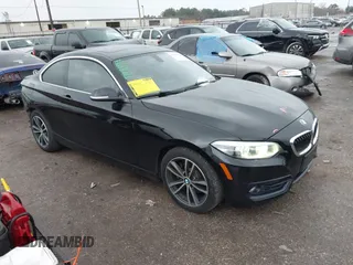 2018 BMW 2 Series 230i with VIN WBA2J1C50JVD09751, listed as a IAAI auction lot 41440752 with 71,700 mi miles. Bid and sale history available at carsss.com. Image 1.