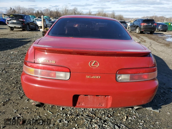 1995 Lexus SC 400 z VIN JT8UZ30C9S0042199, wystawiony jako Copart lot #84843804 z przebiegiem 167 058 mil mil oraz Szkody całkowita. Historia ofert i sprzedaży dostępna na DreamBid. Obrazek 6.