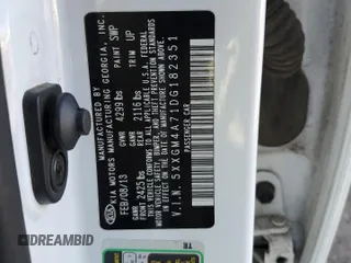 2013 Kia Optima LX z VIN 5XXGM4A71DG182351, wystawiony jako Copart lot #53869324 z przebiegiem 125 893 mil mil oraz Szkoda całkowita • Salvage title. Historia ofert i sprzedaży dostępna na DreamBid. Obrazek 14.