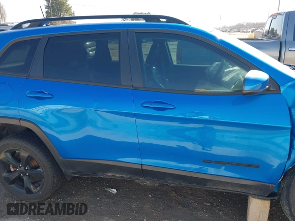 2021 Jeep Cherokee Altitude with VIN 1C4PJLLB6MD134228, listed as a IAAI auction lot 41501177 with 63,357 mi miles. Bid and sale history available at carsss.com. Image 14.