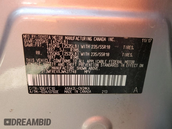 2018 Toyota RAV4 XLE with VIN 2T3WFREVXJW427748, listed as a Copart auction lot 61833055 with 104,057 mi miles and Salvage title. Bid and sale history available at DreamBid. Image 13.