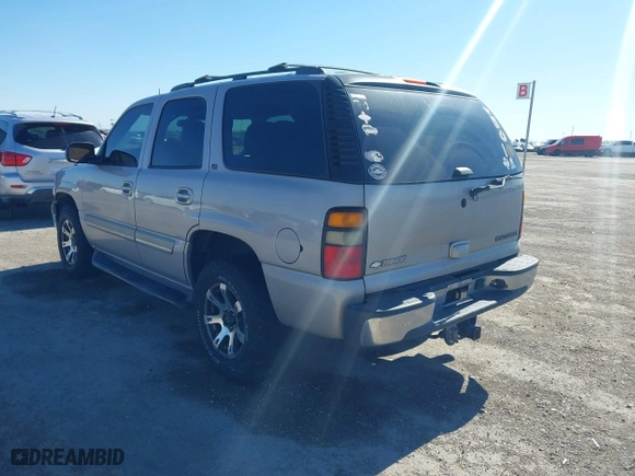 2005 Chevrolet Tahoe LT with VIN 1GNEC13T85J254296, listed as a IAAI auction lot 41676900 with 214,305 mi miles. Bid and sale history available at carsss.com. Image 3.