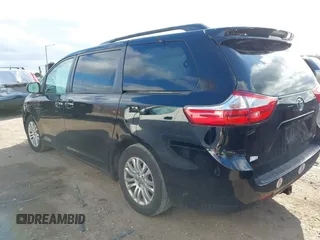 2015 Toyota Sienna XLE with VIN 5TDYK3DC2FS651400, listed as a IAAI auction lot 41985468 with 122,335 mi miles and . Bid and sale history available at DreamBid. Image 3.