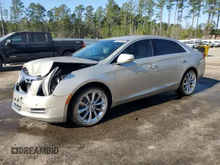 2013 Cadillac XTS Premium z VIN 2G61S5S30D9222930, wystawiony jako Copart lot #48612955 z przebiegiem 70 395 mil mil oraz Szkody całkowita. Historia ofert i sprzedaży dostępna na DreamBid. Obrazek 1.