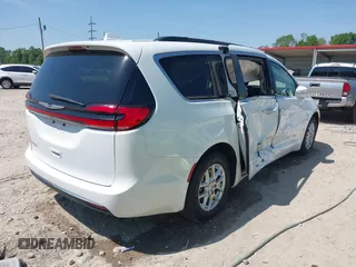 2022 Chrysler Pacifica Touring L with VIN 2C4RC1BG4NR191644, listed as a IAAI auction lot 41979011 with 84,789 mi miles and . Bid and sale history available at DreamBid. Image 4.