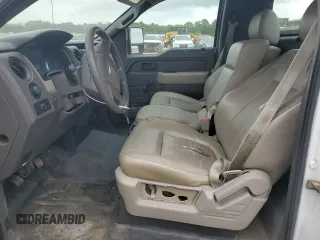 2010 Ford F-150 XL with VIN 1FTMF1CW2AFC54023, listed as a Copart auction lot 57428195 with 183,892 mi miles and Salvage title. Bid and sale history available at DreamBid. Image 7.