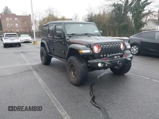 2022 Jeep Wrangler Unlimited Rubicon z VIN 1C4HJXFGXNW127064, wystawiony jako IAAI lot #41491203 z przebiegiem 47 700 mil mil oraz . Historia ofert i sprzedaży dostępna na DreamBid. Obrazek 1.