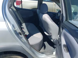 2001 Toyota ECHO with VIN JTDBT123310188981, listed as a IAAI auction lot 41974470 with 137,678 mi miles and . Bid and sale history available at DreamBid. Image 8.