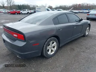2014 Dodge Charger SE with VIN 2C3CDXBG8EH117241, listed as a IAAI auction lot 41952443 with 158,432 mi miles and . Bid and sale history available at DreamBid. Image 4.