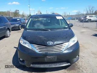 2012 Toyota Sienna XLE with VIN 5TDDK3DC1CS047105, listed as a IAAI auction lot 41901541 with 176,476 mi miles. Bid and sale history available at carsss.com. Image 12.