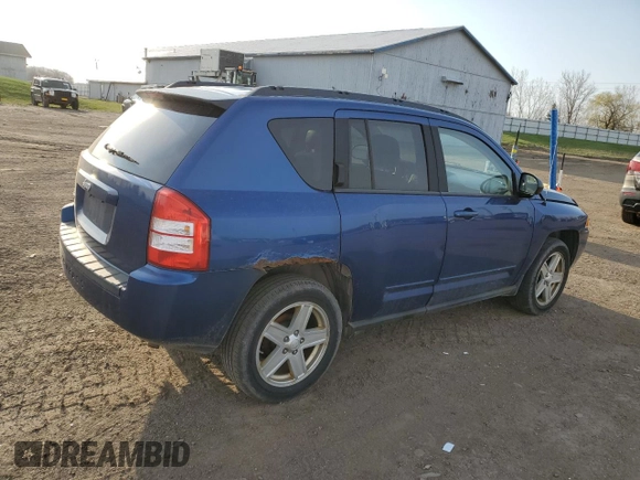2010 Jeep Compass North Edition with VIN 1J4NF4FB2AD575774, listed as a Copart auction lot 52617805 with 130,645 mi miles and Clean Title. Bid and sale history available at carsss.com. Image 3.