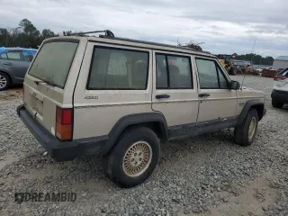 1995 Jeep Cherokee Sport with VIN 1J4FJ68S4SL618773, listed as a Copart auction lot 74126954 with 318,519 mi miles and Salvage title. Bid and sale history available at DreamBid. Image 3.
