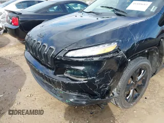 2017 Jeep Cherokee Altitude with VIN 1C4PJLAB7HW660624, listed as a IAAI auction lot 41488683 with 106,963 mi miles and . Bid and sale history available at DreamBid. Image 6.