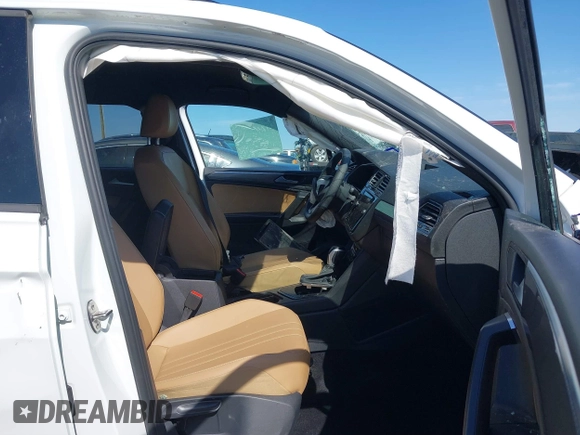 2022 Volkswagen Tiguan SE R-Line Black with VIN 3VVCB7AX9NM009779, listed as a IAAI auction lot 41696952 with Not provided miles and . Bid and sale history available at DreamBid. Image 5.
