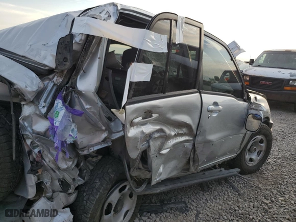 2004 Suzuki Grand Vitara LX with VIN JS3TD62V744104983, listed as a Copart auction lot 65290274 with 0 mi miles and Salvage Title. Bid and sale history available at carsss.com. Image 11.
