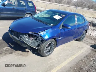 2014 Toyota Corolla L with VIN 5YFBURHE4EP006267, listed as a IAAI auction lot 41658018 with 96,423 mi miles and . Bid and sale history available at DreamBid. Image 2.