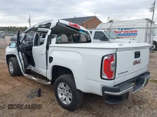 2015 GMC Canyon 2WD SLE with VIN 1GTG5BE33F1132736, listed as a IAAI auction lot 41094687 with 26,185 mi miles. Bid and sale history available at carsss.com. Image 3.
