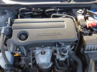 2025 Honda Civic Sport with VIN 2HGFE2F5XSH521799, listed as a IAAI auction lot 41831110 with 5,406 mi miles and . Bid and sale history available at DreamBid. Image 10.