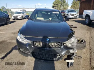 2015 BMW 3 Series 328i xDrive with VIN WBA3B3C59FJ985091, listed as a Copart auction lot 57658705 with 106,521 mi miles and Salvage title. Bid and sale history available at DreamBid. Image 5.