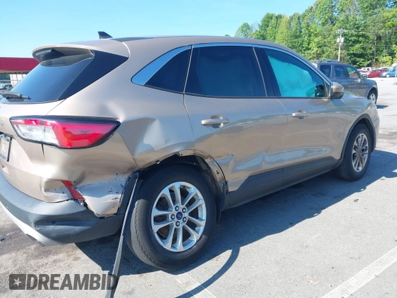 2021 Ford Escape SE with VIN 1FMCU0G67MUA00194, listed as a IAAI auction lot 42406942 with 62,553 mi miles and . Bid and sale history available at DreamBid. Image 6.