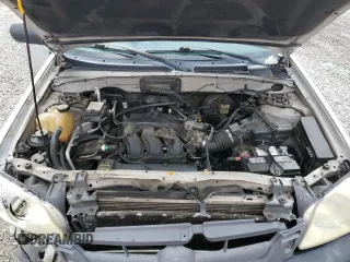 2003 Mazda Tribute LX with VIN 4F2YZ04153KM20941, listed as a Copart auction lot 82683264 with 195,240 mi miles and Salvage Title. Bid and sale history available at DreamBid. Image 14.
