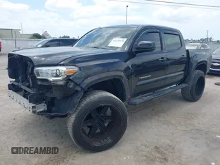 2017 Toyota Tacoma SR5 z VIN 5TFAZ5CN1HX039505, wystawiony jako IAAI lot #42175538 z przebiegiem 130 449 mil mil oraz . Historia ofert i sprzedaży dostępna na DreamBid. Obrazek 2.