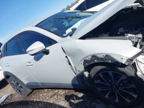 2019 Mazda CX-3 Touring with VIN JM1DKDC70K1406403, listed as a IAAI auction lot 41719684 with 119,602 mi miles. Bid and sale history available at carsss.com. Image 14.