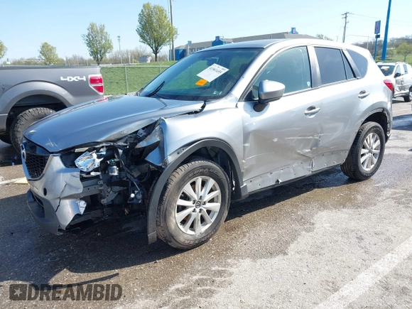 2013 Mazda CX-5 Touring with VIN JM3KE2CE6D0164430, listed as a IAAI auction lot 41961655 with 194,278 mi miles. Bid and sale history available at carsss.com. Image 2.