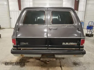 1991 GMC Suburban z VIN 1GKEV16K5MF500359, wystawiony jako Copart lot #81125224 z przebiegiem 177 181 mil mil oraz Tytuł czysty. Historia ofert i sprzedaży dostępna na DreamBid. Obrazek 6.