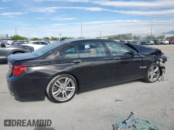 2015 BMW 7 Series 750Li with VIN WBAYE8C59FD781223, listed as a Copart auction lot 54944265 with 125,203 mi miles and Salvage title. Bid and sale history available at DreamBid. Image 3.