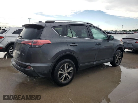 2018 Toyota RAV4 XLE with VIN 2T3WFREV6JW411935, listed as a Copart auction lot 54218405 with 123,831 mi miles and Salvage title. Bid and sale history available at DreamBid. Image 3.