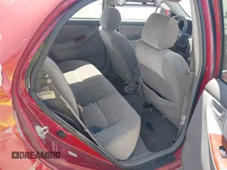 2005 Toyota Corolla CE with VIN 1NXBR32E55Z411298, listed as a IAAI auction lot 42082065 with 220,695 mi miles. Bid and sale history available at carsss.com. Image 8.