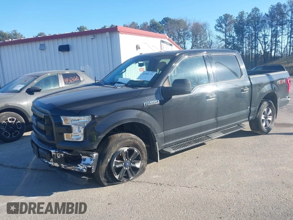 2015 Ford F-150 XLT with VIN 1FTEW1E86FFC00959, listed as a IAAI auction lot 41581711 with 130,298 mi miles. Bid and sale history available at carsss.com. Image 6.
