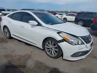 2015 Hyundai Azera Limited z VIN KMHFH4JG7FA476458, wystawiony jako IAAI lot #41893979 z przebiegiem 149 114 mil mil oraz . Historia ofert i sprzedaży dostępna na DreamBid. Obrazek 1.