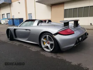 2004 Porsche Carrera GT z VIN WP0CA29894L001019, wystawiony jako Copart lot #52988584 z przebiegiem 4486 mil mil oraz Szkody całkowita. Historia ofert i sprzedaży dostępna na DreamBid. Obrazek 2.