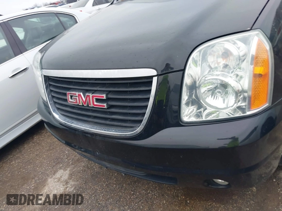 2014 GMC Yukon SLT with VIN 1GKS1CE02ER207447, listed as a IAAI auction lot 41604134 with 199,417 mi miles. Bid and sale history available at carsss.com. Image 12.