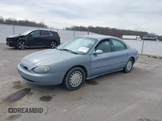 1997 Mercury Sable GS z VIN 1MELM50U5VA652727, wystawiony jako IAAI lot #41701998 z przebiegiem 213 563 mil mil oraz . Historia ofert i sprzedaży dostępna na DreamBid. Obrazek 2.